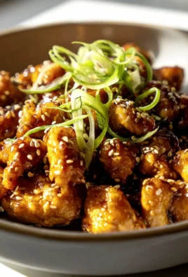 Karamellisiertes Sesam Hähnchen: Süß-salzige Perfektion!