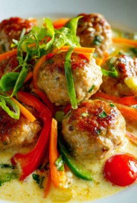 Saftige Thai Hähnchen-Frikadellen in cremigem Kokos-Curry